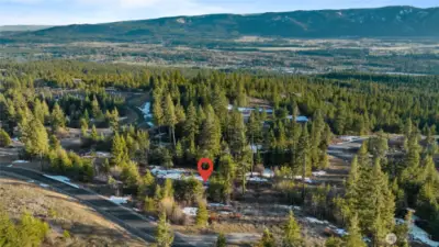 View from above of lot 47.  Lot 48 is sold and a home is nearly complete.  The owner of lot 46 is nearing completion of their home.