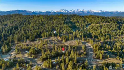 Lot 46 is left of the marker.  Lot 48 is right of the marker. Lot 47 is between them.  There are now homes being built on lots 46 and 48.