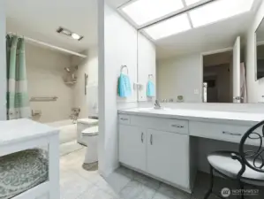 Storage cabinet and area w/ chair space.