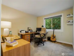 Second of the three upstairs bedrooms, currently used as a home office.