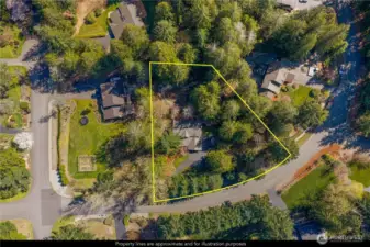 This aerial phots really highlights the spacious greenbelt and the western part of the property, a lush woodland area, nearly a quarter acre, adds an extraordinary sense of seclusion & natural beauty rarely found in a residential setting. A meandering brook runs down the east side of the property, feeding into a charming pond stocked w/goldfish.