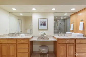 Primary bath w/vanity & 2 sinks. Granite countertops. Water closet. Heated floors.