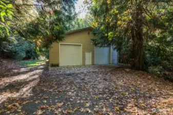 2160' shop w/separate driveway.  An easy walk from the house. Newly painted floor. Own power & transformer.