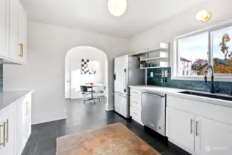 A dining nook sits at the back of the kitchen creating a more casual eating experience.