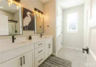 The bathroom floors are upgraded with 12 x 24 tile.