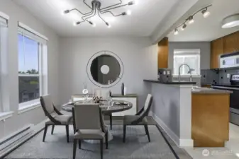 Dining room with views from the window. Virtually staged.