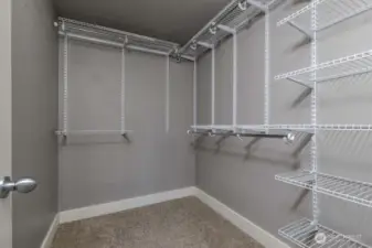 Primary bedroom with walk-in closet.