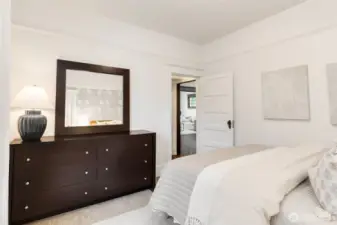 There is plenty of space in this bedroom for a very large dresser and this is a Queen bed.