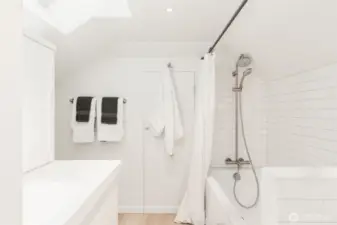 The primary bath tub/shower.