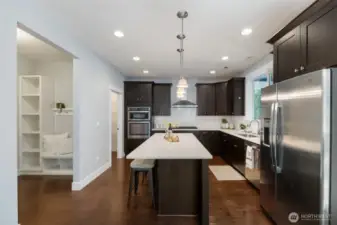 Spacious and upgraded kitchen includes island seating