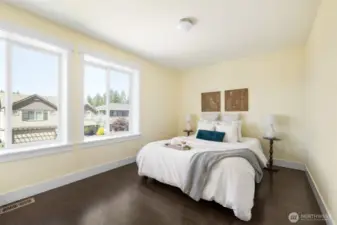 3rd bedroom facing street, between bathroom and playroom