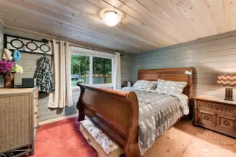 Downstairs bedroom with queen bed