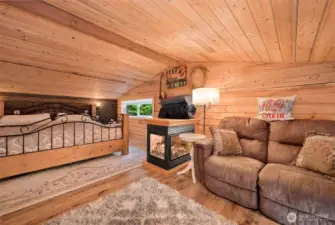 Primary Suite with king bed and sitting area.