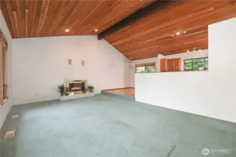 Living room off the dining room and kitchen.