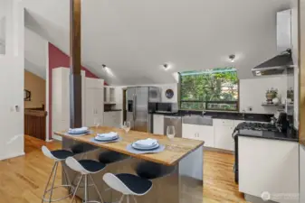 Wood block kitchen island with eating space.