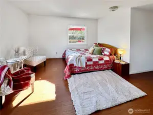 The primary bedroom is located on opposite end of the home for privacy with private 3/4 bath.