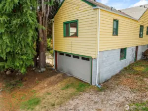 Attached two car garage with rear alley access.
