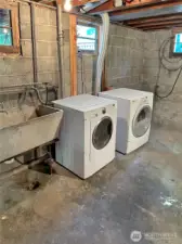 Laundry area in the full basement.  There is a large unfinished basement that is great for extra storage and projects.