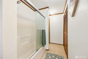 Tub & shower separating each bedroom upstairs.
