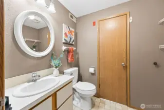 Half bath/laundry room on the main floor.