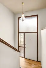 Split level entryway faces north and is in the center of the home. Allowing ease of access from the upstairs level to the downstairs level. Both levels are above grade.