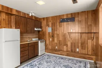 Lower level kitchenette. Potential for rental income or a private guest suite that also sports a separate entrance, and ample parking.