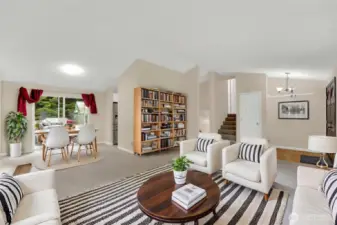 Virtually staged living room, dining room areas.