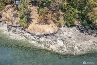 Stairs to the rocky shoreline.