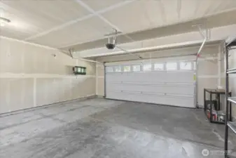 Large Double Car garage with quiet closure.