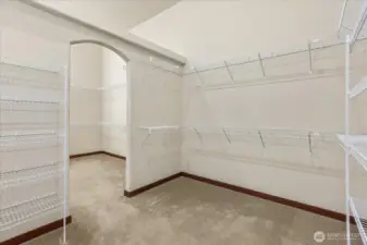 Can’t forget side two! The second half of the spacious walk-in closet offers even more storage.closet off the primary