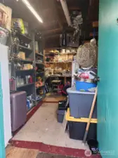 Many shelves and a work bench.