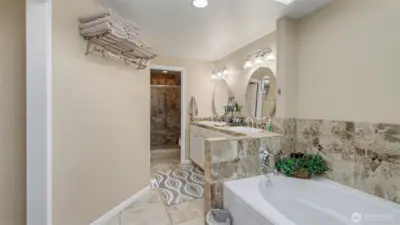 A thoughtfully designed ensuite with room to relax and refresh.