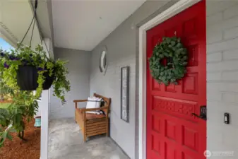 Covered front porch, perfect for your morning coffee.