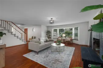 Large bay window brings in an abundance of natural light.  Perfect for hanging plants!