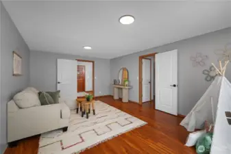 Additional living space with slider access to back deck. What will you use this space for?