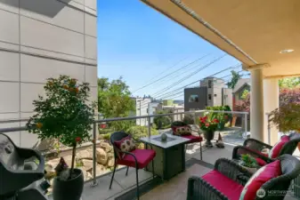 Large covered southeast facing deck with city views.