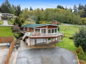 Aerial view of home and surrounding properties / lots of mature landscaping in this neighborhood.