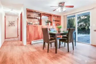 Down the hall is the dining room with built-in cabinetry for abundant storage and plenty of display shelving.