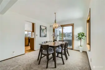 The formal dining room is easily accessible to the kitchen and has separate access to the entertaining deck with extensive territorial views.