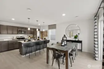 Open Concept living/dinining/kitchen-Interior Pictures: Disclaimer- Photos are of another Lina floor plan from a previous community, photos are for illustrative purposes only. Finishes, flooring, upgrades, or other features may vary.