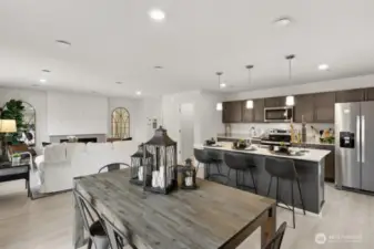 Open Concept living/dinining/kitchen-Interior Pictures: Disclaimer- Photos are of another Lina floor plan from a previous community, photos are for illustrative purposes only. Finishes, flooring, upgrades, or other features may vary.