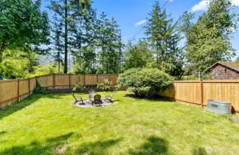 Fenced front yard facing the road. Peek a boo view!