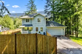 Font of home, RV parking by fence, or enough room in the driveway. Sellers have moved their R.V. it was parked on the right of the driveway.