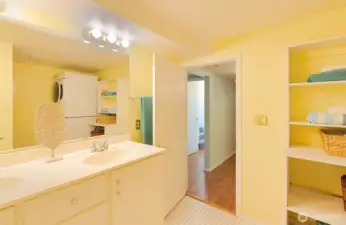 Lower level 3/4 bath includes the laundry facilities -- and lots more storage!