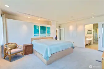 The en suite bathroom features a soaking tub, shower, closet and washer/dryer hookup.
