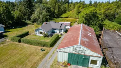 Home & huge shop on 3.93 acres of development land