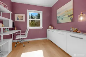 A convenient office space is located off the kitchen area.