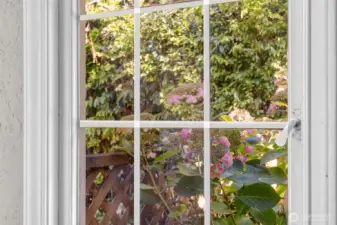 Beautiful leaded windows highlight the historic character of this Tudor gem