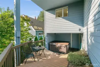 Hot tub is under a covered area to keep it clean and usable.
