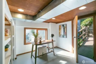 Extra unfinished space offers storage or separate work from home space.